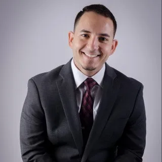  Lawyer Alain E Roman